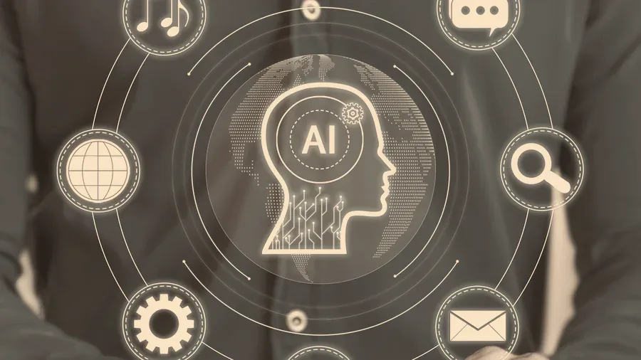AI and automation icons surrounding a person at a laptop